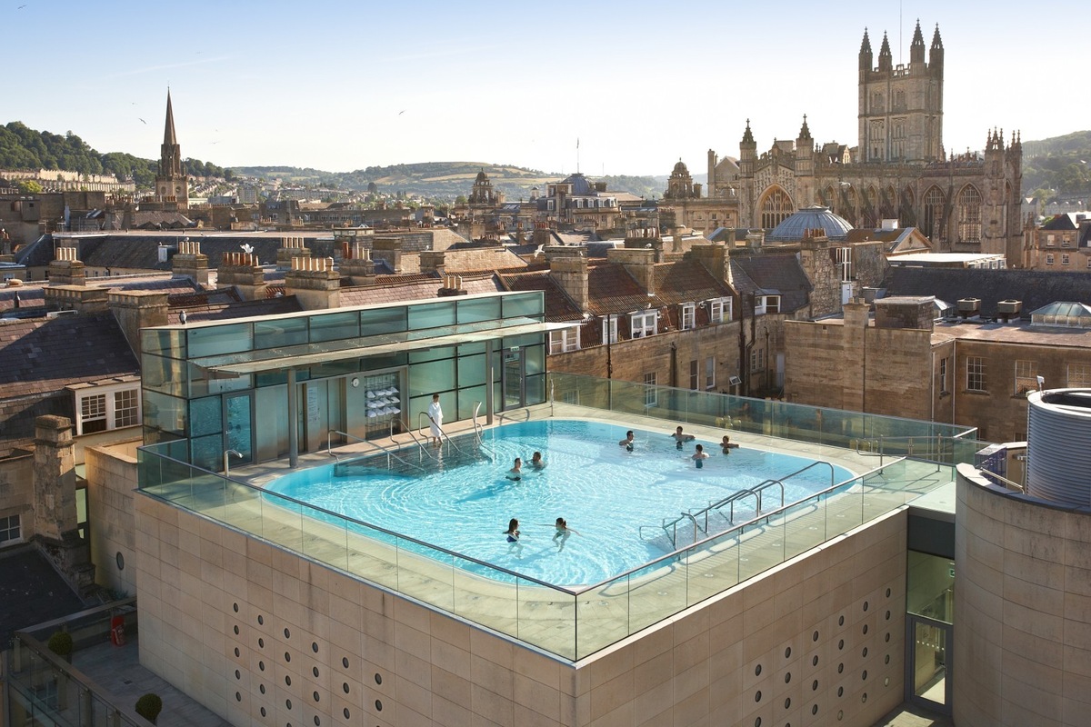 Thermae Bath Spa rooftop pool overlooking Bath Abbey and the city skyline